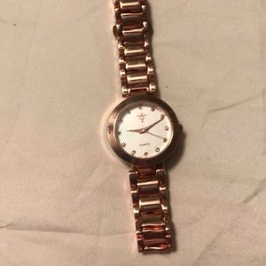 Rose gold woman’s watch